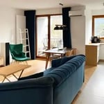 Long-term rental in Warsaw, Wola — 3-room 70 m² apartment with balcony, air conditioning, and smart home system