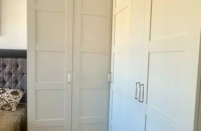 Long-term rental 2-bedroom apartment with balcony and parking in Courbevoie, France