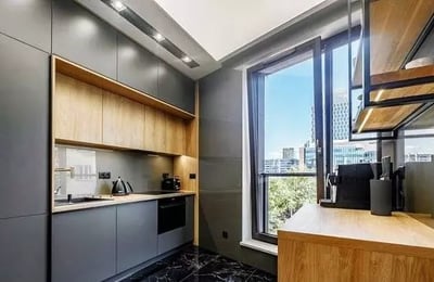 Long-term rental of a modern 3-room apartment in Wola (Warsaw) with a balcony and underground parking