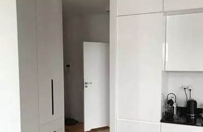 Long-term rental of a 54 m² 3-room apartment on Konstruktorska Street, Warsaw, Poland, with a balcony and parking