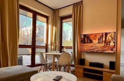 Rent of a modern two-room apartment, 52 m², with a private garden, Jelonki Południowe, Warsaw, Poland