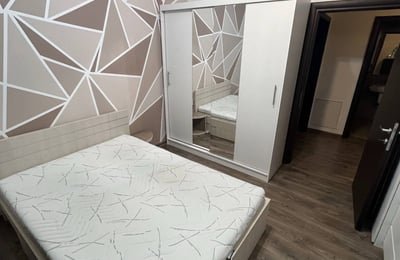 Rent of a bright furnished two-room apartment near Titan Park, Bucharest, Romania