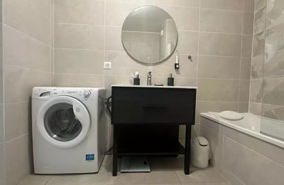 Long-term rental 2-bedroom apartment with balcony and parking in Courbevoie, France