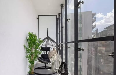 Long-term rental of a stylish apartment with a terrace in Wola (Warsaw), parking included