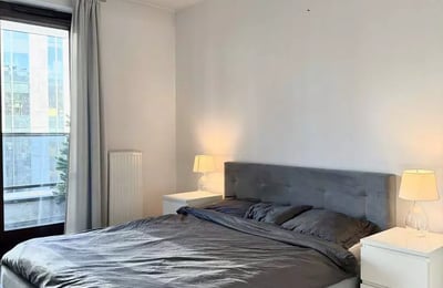 Long-term rental of a cozy 2-room apartment with balcony and parking in Wola, Warsaw