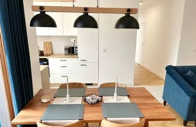 Long-term rental in Warsaw, Wola — 3-room 70 m² apartment with balcony, air conditioning, and smart home system