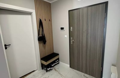 Long-term rental of a modern 54 m² 2-room apartment with a balcony in the quiet Mistrzejowice area, Krakow