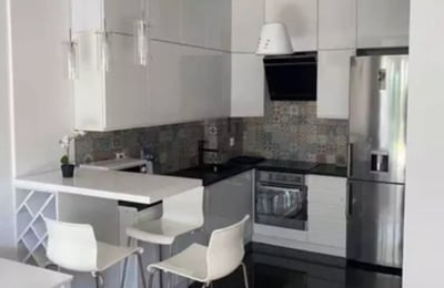 Long-term rental of a modern 50 m² 2-room apartment with a terrace in Zawady, Wilanów, Warsaw