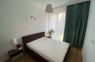 Long-term rental of a modern 50 m² 2-room apartment with a terrace in Zawady, Wilanów, Warsaw