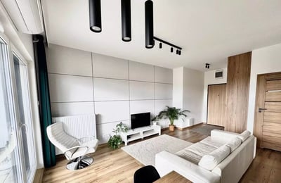 Long-term rental of a cozy apartment with balcony and parking in Warsaw