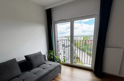 Long-term rental of a cozy apartment with balcony and parking in Warsaw