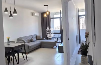 Location à long terme — nouvel appartement 1+1 avec vue mer et montagne à Batoumi