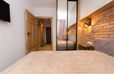 Location longue durée d’un appartement 2 pièces de 32 m² à Przedmieście Warszawskie, Cracovie, Pologne