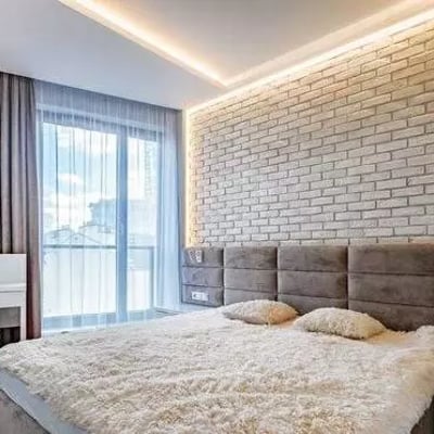 Long-term rental of a modern 3-room apartment in Wola (Warsaw) with a balcony and underground parking