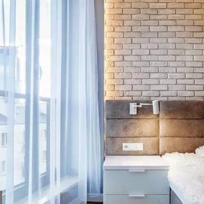 Long-term rental of a modern 3-room apartment in Wola (Warsaw) with a balcony and underground parking