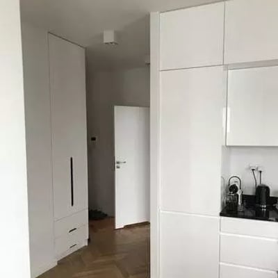 Long-term rental of a 54 m² 3-room apartment on Konstruktorska Street, Warsaw, Poland, with a balcony and parking