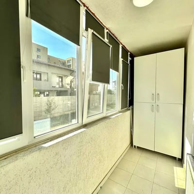 Долгосрочная аренда двухкомнатной квартиры с балконом в новострое, 1 этаж, Бухарест, Румыния
