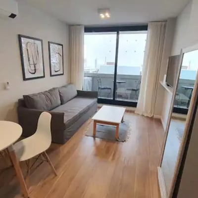 Long-term rental in Buenos Aires: Modern 2-room apartment with balcony, rooftop pool and gym in Palermo Soho