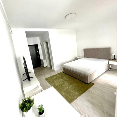 Location d’un appartement lumineux d’une pièce avec balcon, Bucarest, Chiajna, Roumanie