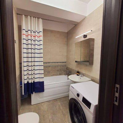 Long-term rent of an apartment with a parking space in a convenient area of ​​Bucharest
