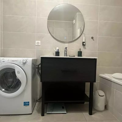 Long-term rental 2-bedroom apartment with balcony and parking in Courbevoie, France