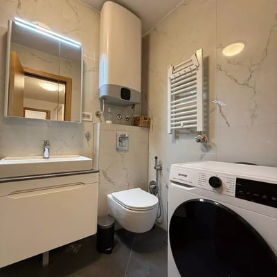 Long-term rental of a three-room apartment in a premium-class residential complex in the center of Belgrade