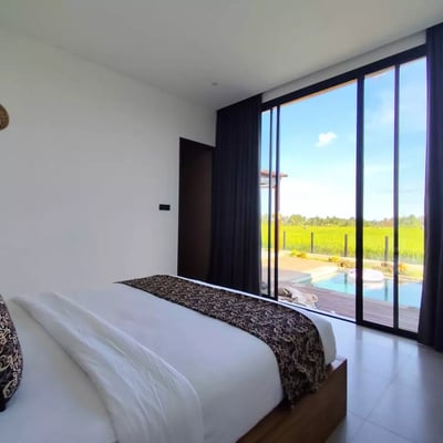 Long-term rental in Bali brand-new villa in Peliatan with pool and rice field view