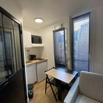 Long-term rental in Paris — 12m² studio on the 5th floor without elevator, near métro Charles Michel