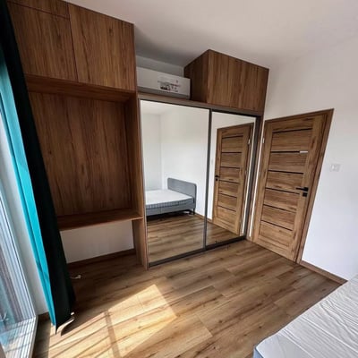 Long-term rental of a cozy apartment with balcony and parking in Warsaw