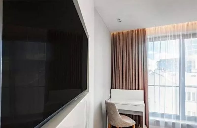 Long-term rental of a modern 3-room apartment in Wola (Warsaw) with a balcony and underground parking