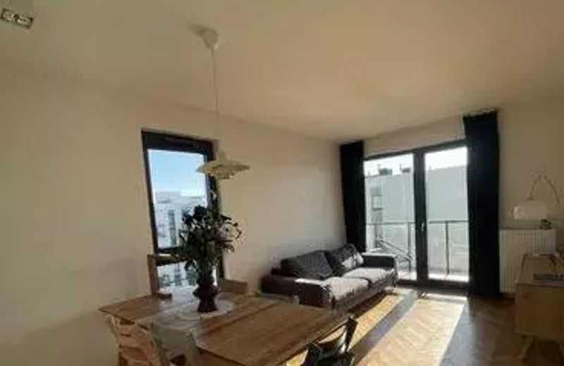 Long-term rental of a 54 m² 3-room apartment on Konstruktorska Street, Warsaw, Poland, with a balcony and parking