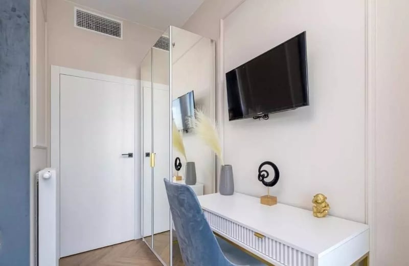 Long-term rental of a stylish apartment with a terrace in Wola (Warsaw), parking included