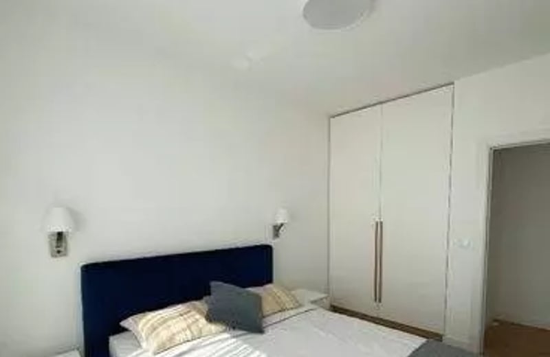 Long-term rental in Warsaw, Wola — 3-room 70 m² apartment with balcony, air conditioning, and smart home system